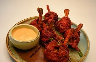 Delicious Chicken Lollipop dish at Mumbai Bites in Calgary, AB
