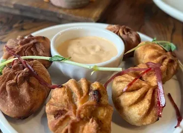 Delicious chicken momos in Calgary, AB